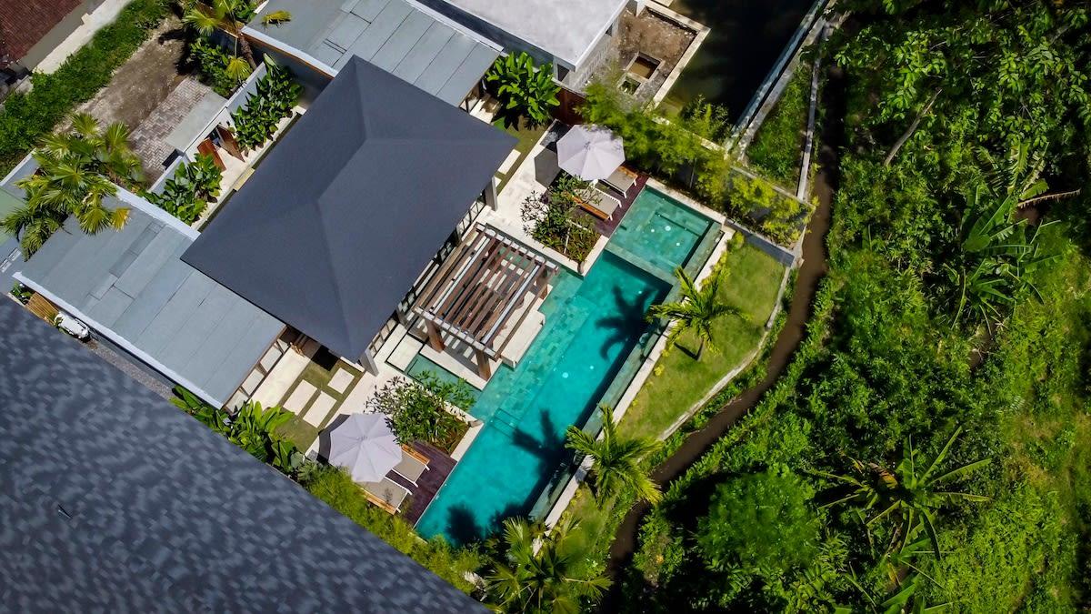 Drone view of the villa and its natural surroundings 