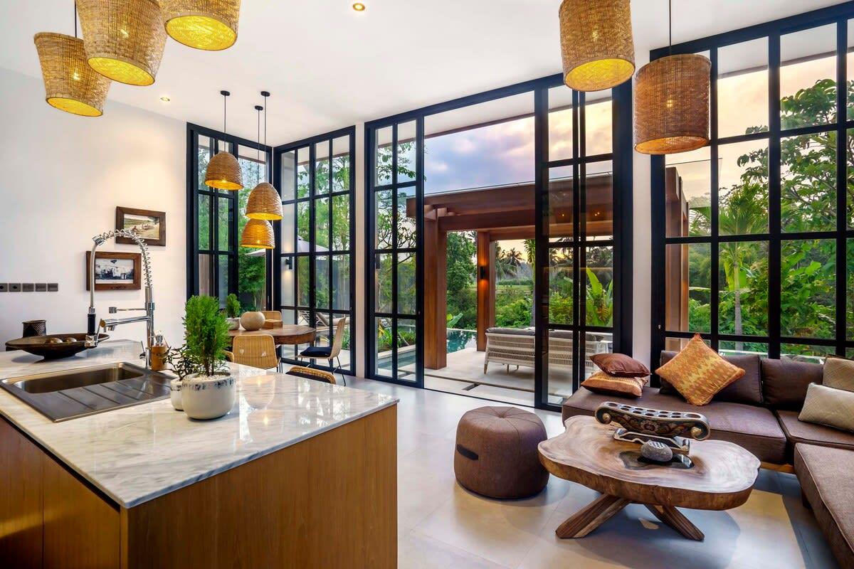 Inside living area surrounded by beautiful glass windows 