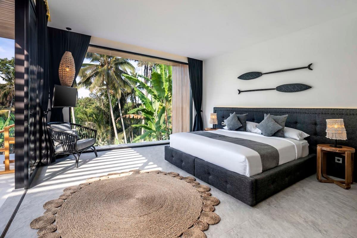 Spacious bedroom illuminated by natural daylight