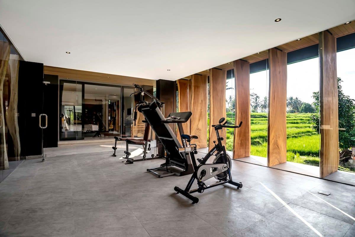 Equipped gym overlooking the rice fields 