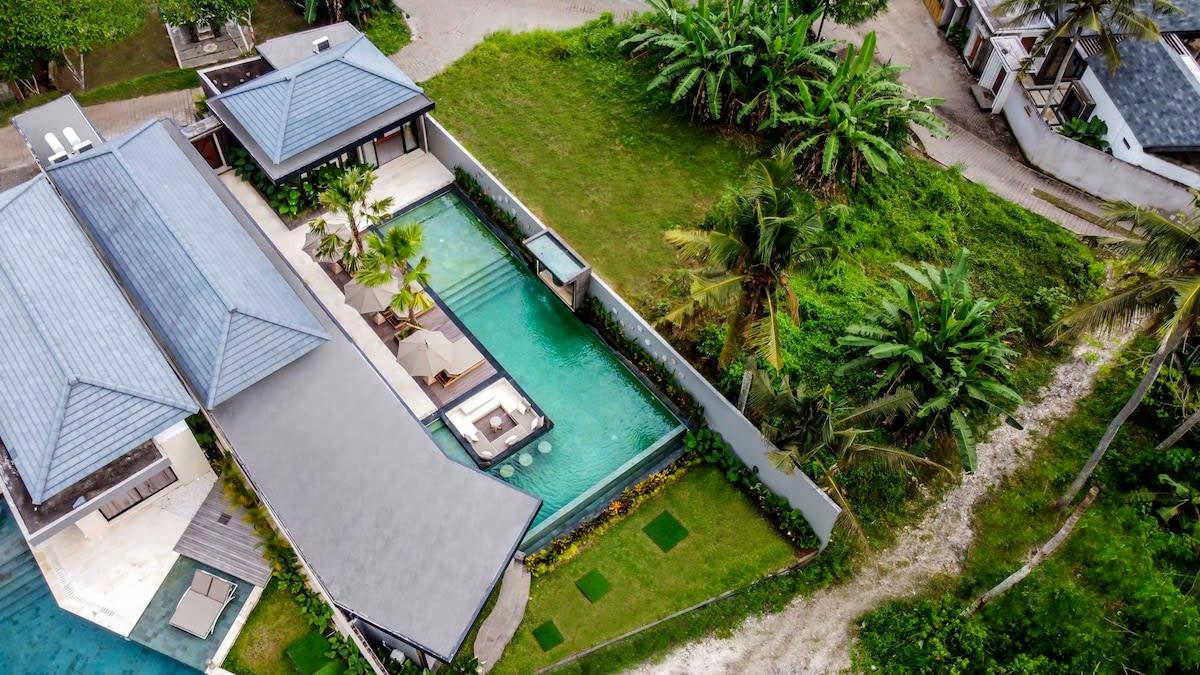 Drone view of the villa and its natural surroundings 