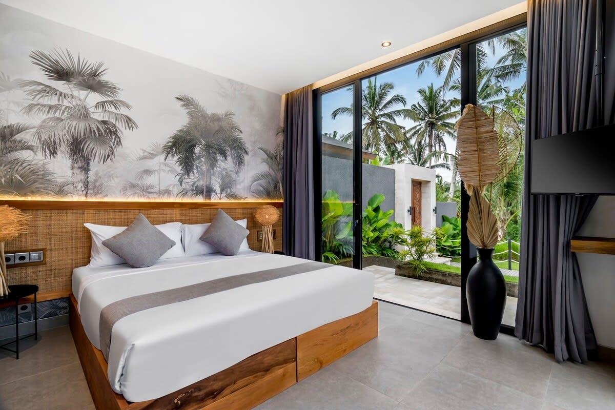 Spacious bedroom with a view of the entrance of the villa  