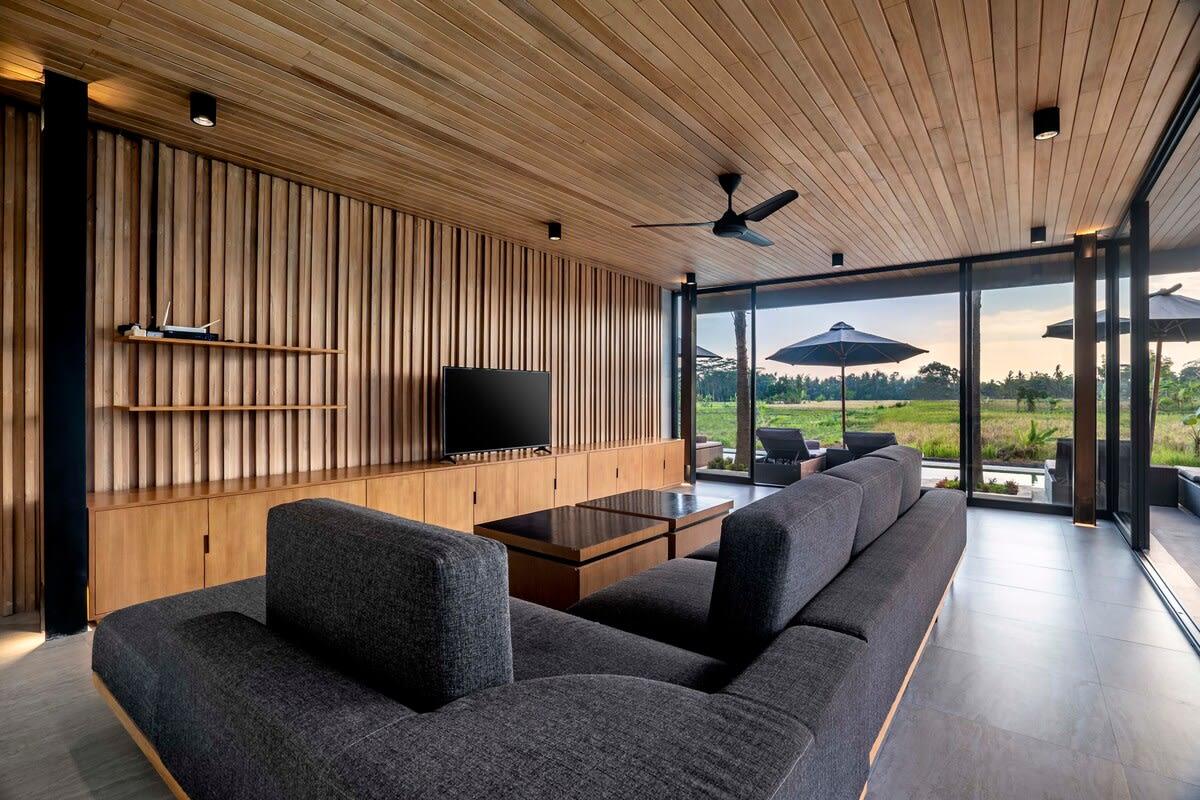 Wooden styled living area with a view of the rice fields