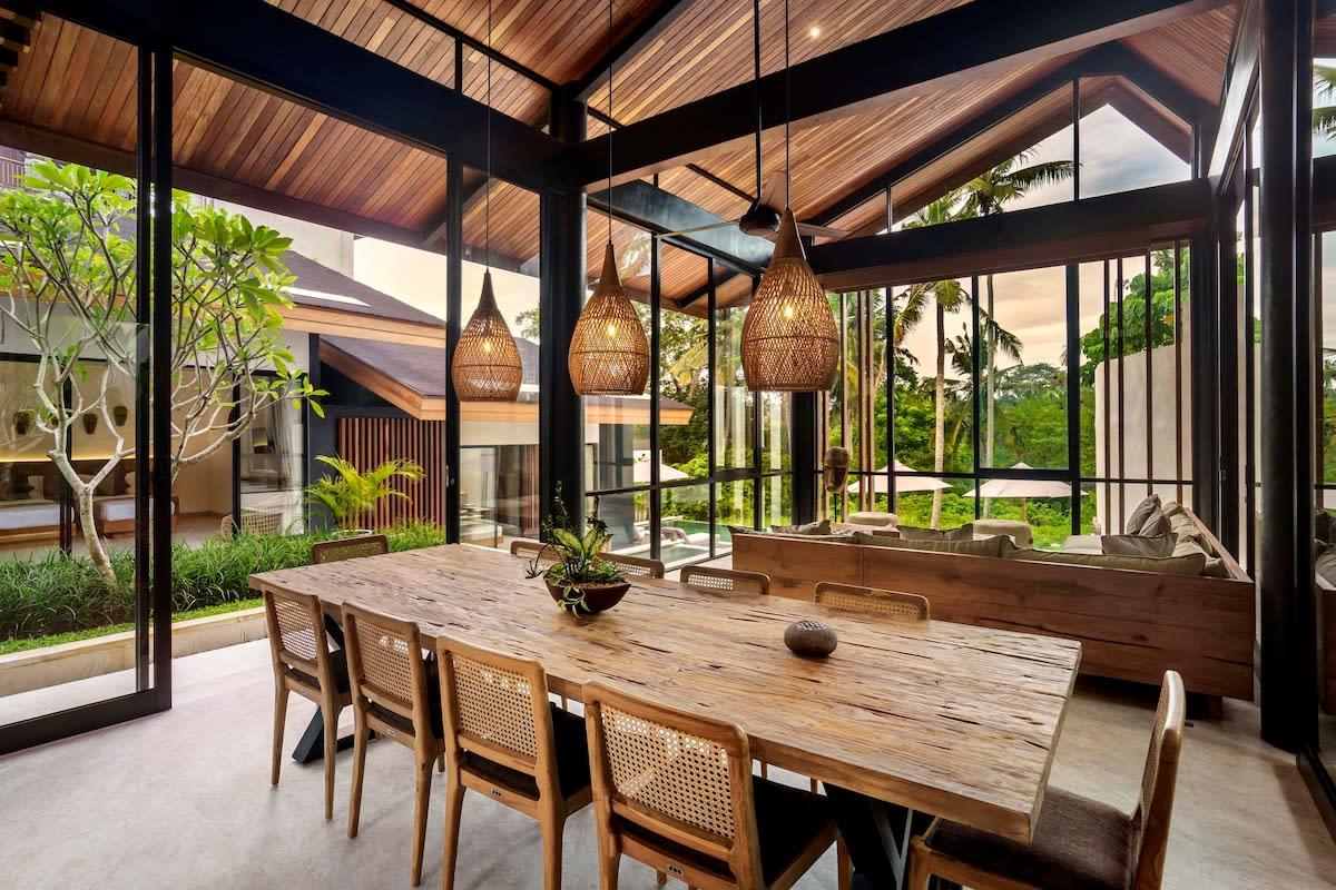 Naturally illuminated dining area with an authentic wooden interior