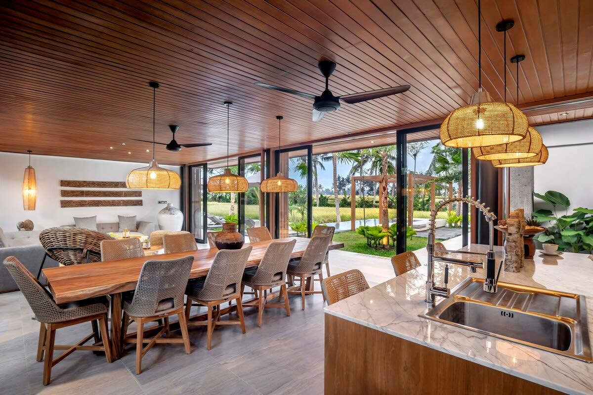 Beautiful inside dining room and kitchen with a rice field view