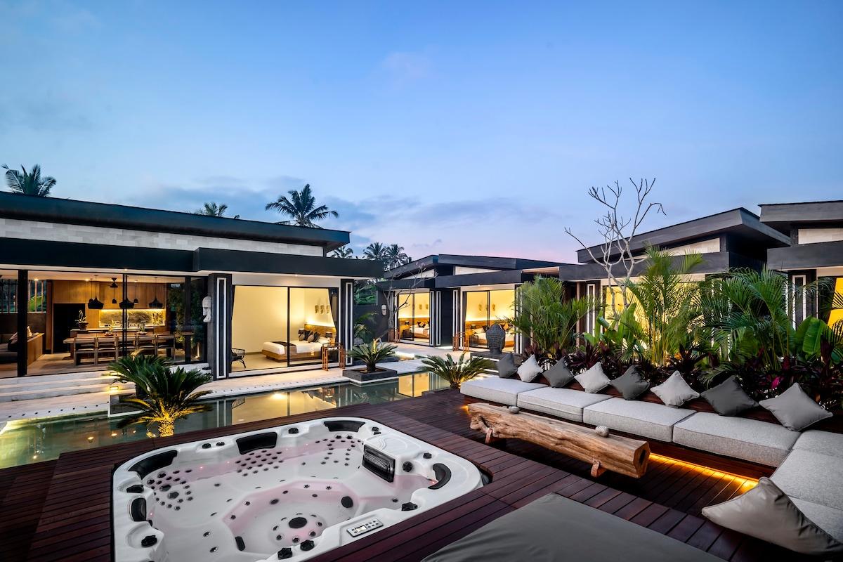 View of the outside area with jacuzzi at nighttime