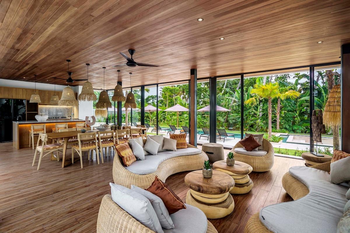 Beautiful inside living and dining area with a forest view 
